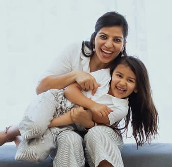 Mother and daughter in a modern residential living space